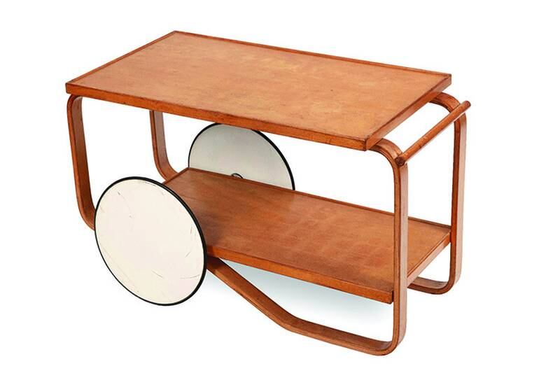 Teatime comes to modern time. Scandinavian modern design gives an Artek tea trolley a sleek, stylish look.