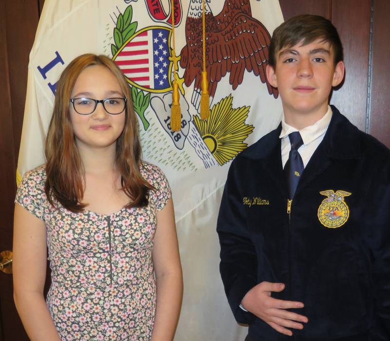 Rylee Phillips and Toby Williams read their winning essays during the Soil Health Week Rally and Lobby Day on March 6. The contest was hosted by the Association of Illinois Soil and Water Conservation Districts.