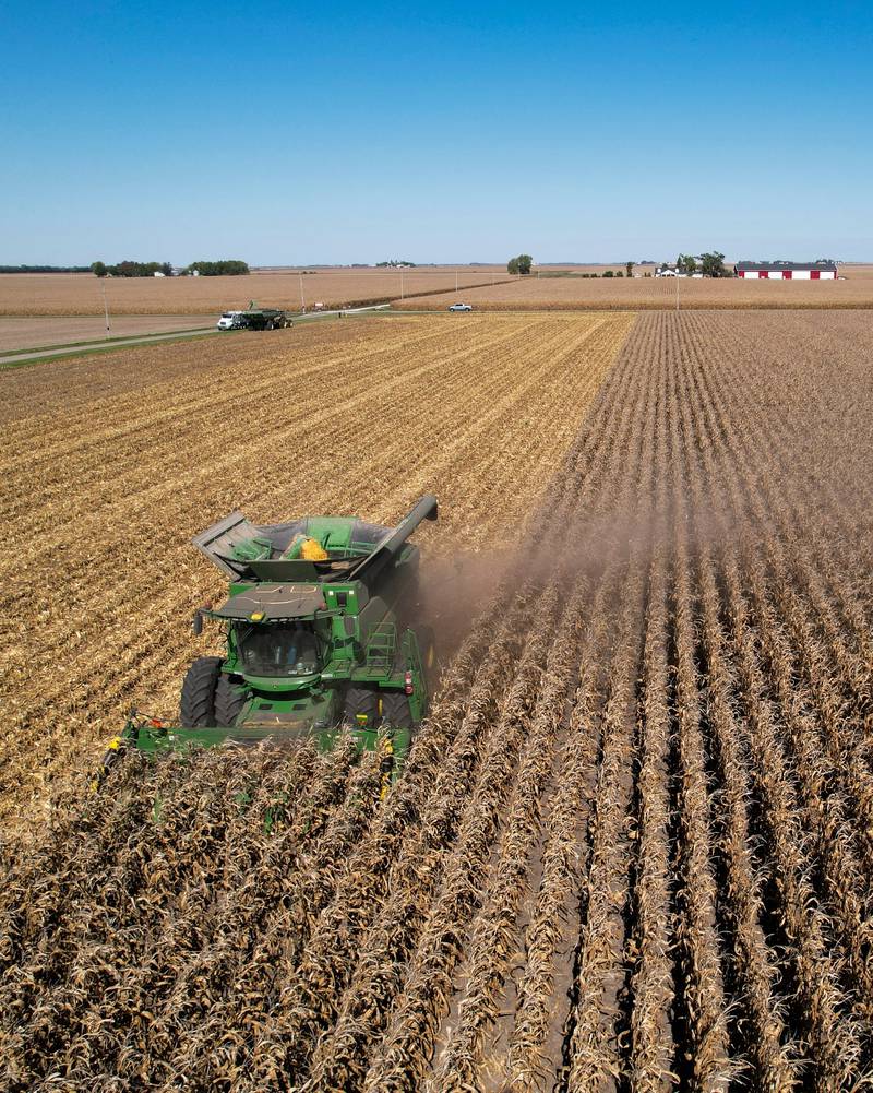 On the cover: A combine harvests corn at a farm near Allerton, Illinois.