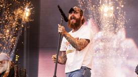Music Review: Post Malone’s country album is a long time coming