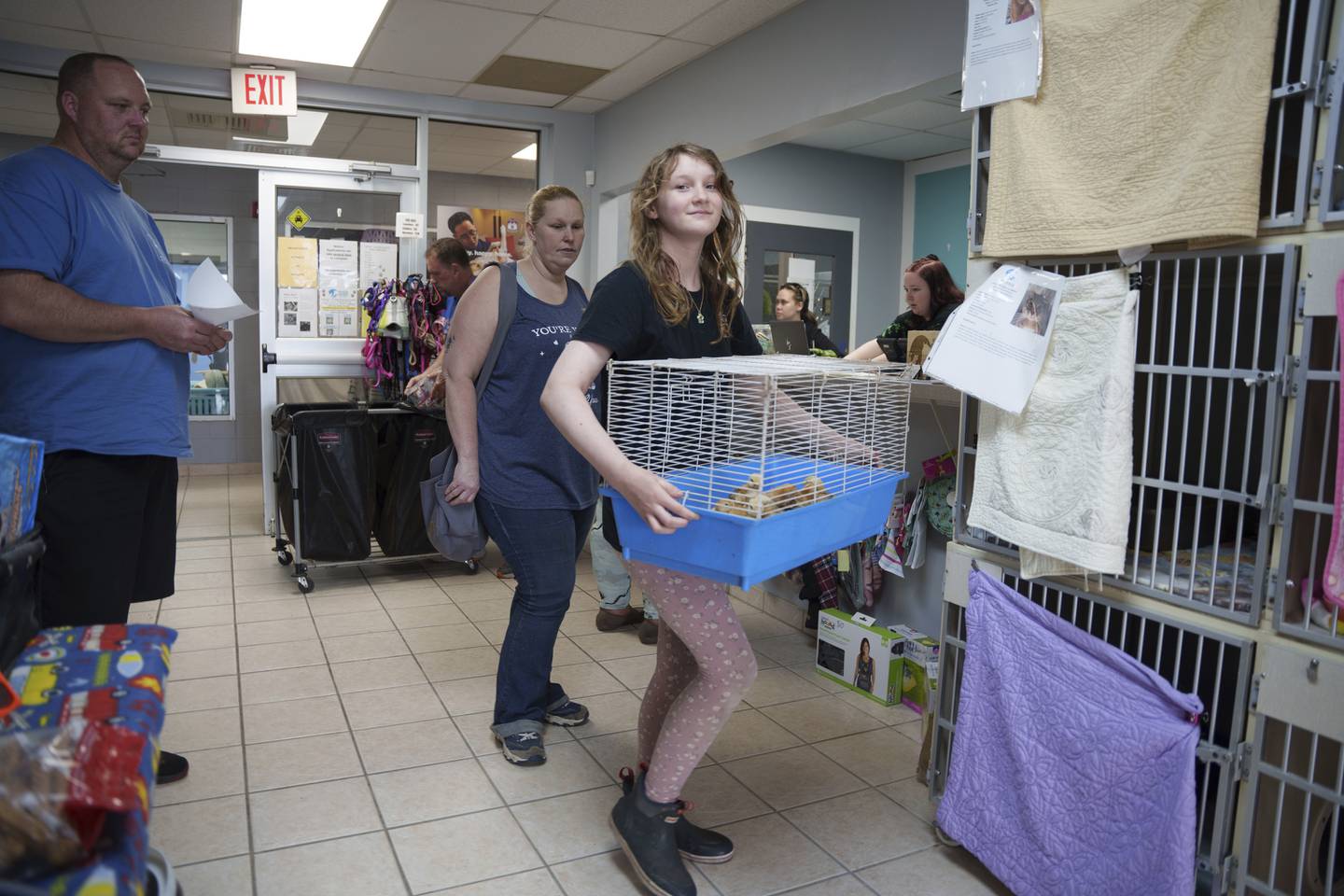 The Bruzdzinski family adopt chicks at First State Animal Center and SPCA in Camden, Delaware.