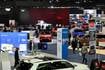 At Detroit auto show, spotlight dims for EVs