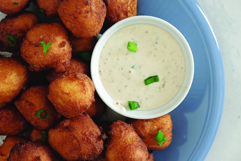 Golden, crispy hush puppies served with a zesty remoulade.