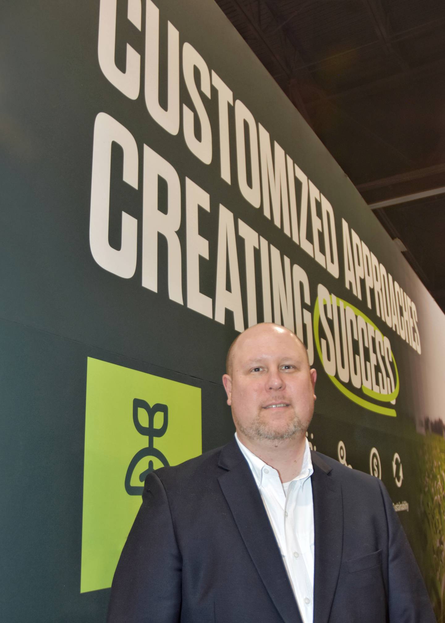 John Maman, senior director of business development for Nutrien Financial, poses for a photo at the company’s booth at the Commodity Classic trade show. The exhibit emphasized how the business builds customized approaches that create success for growers.