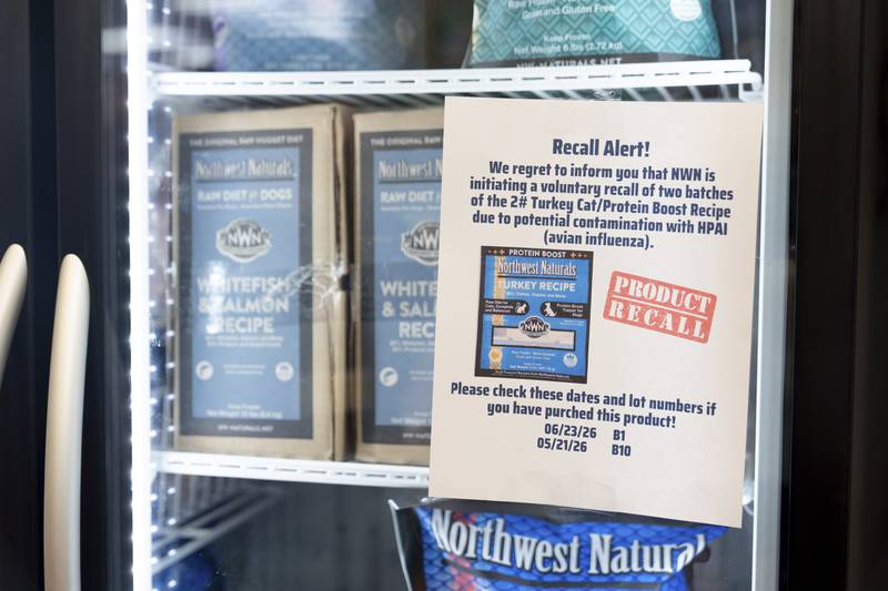 A recall alert is displayed on a refrigerator at a pet store in Tigard, Oregon, after Northwest Naturals announced a voluntary recall of one batch of its 2-pound Feline Turkey Recipe raw frozen pet food after it tested positive for the virus.
