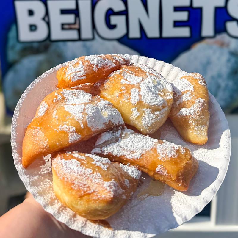 Hot Honey Beignets by The Bakerman. Their famous New Orleans-style beignets have been a State Fair favorite for decades - now with a new, sweet and spicy kick!