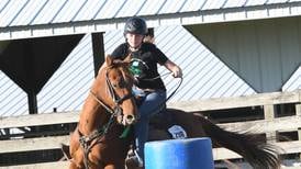 Teen turns ‘untouchable’ horse into barrel racer