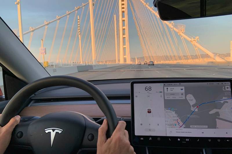 A vehicle equipped with forward collision warning, like this a 2020 Tesla Model Y, can alert a driver if the system detects that a frontal collision is likely or imminent.