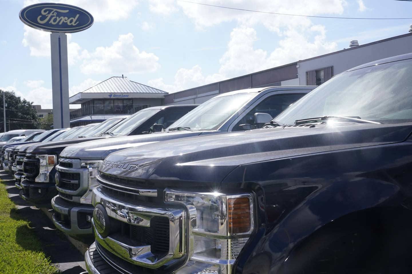 Ford F150 trucks are displayed at a dealership in Hialeah, Florida.