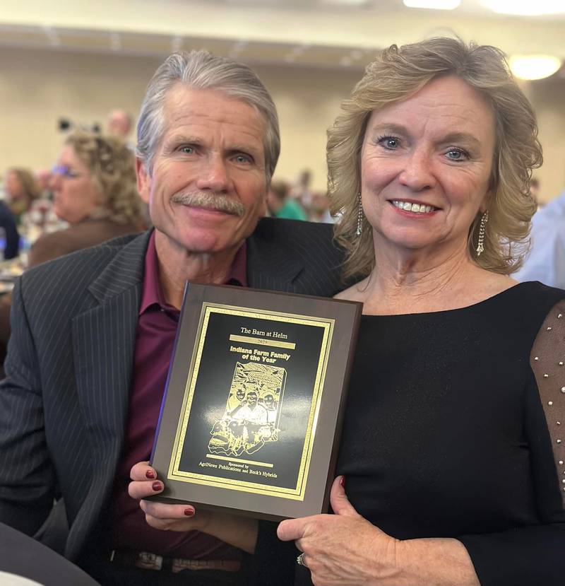 Tim and Julie Frame receive the 28th annual Indiana Farm Family of the Year Award. AgriNews and Beck’s partner each year to recognize Hoosier farm families who exemplify leadership, community involvement and innovation both on and off the farm.