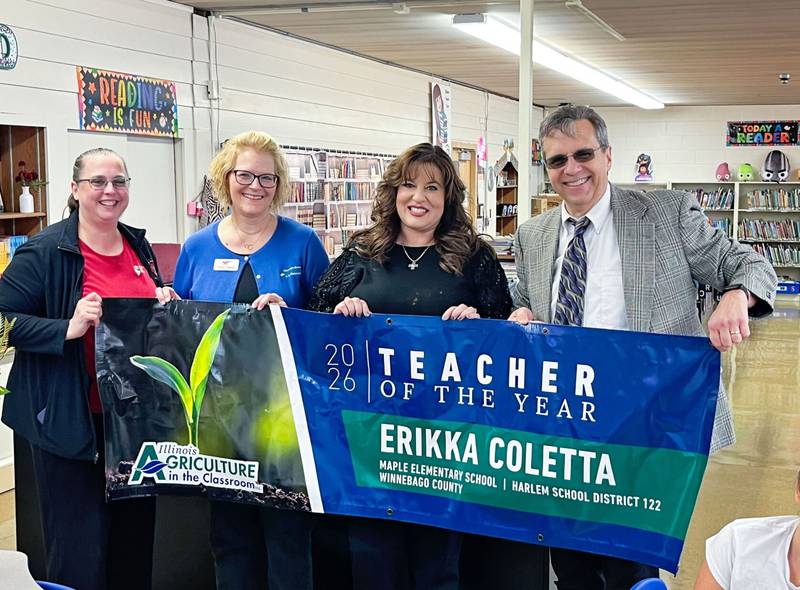 Illinois Agriculture in the Classroom 2026 Teacher of the Year Erikka Coletta (second from right) accepts the award from Kevin Daugherty, IAITC education director, with Ann Marie Cain (from left), Winnebago-Boone Farm Bureau manager, and Diane Cleland, Winnebago-Boone AITC coordinator.