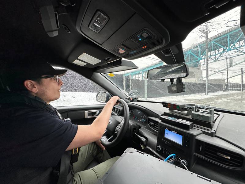Detroit Police Commercial Theft Section Officer Ibrahim Kakish participates in a demonstration of how Ford is using technology to fight thefts of its F-150 pickups and F-250 Super Duty pickups.